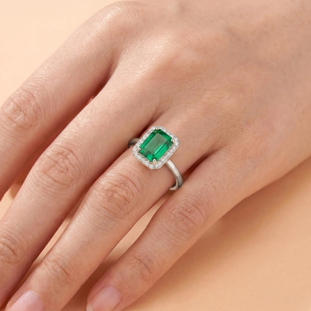 Emerald Halo Silver Promise Ring on Girls Hand